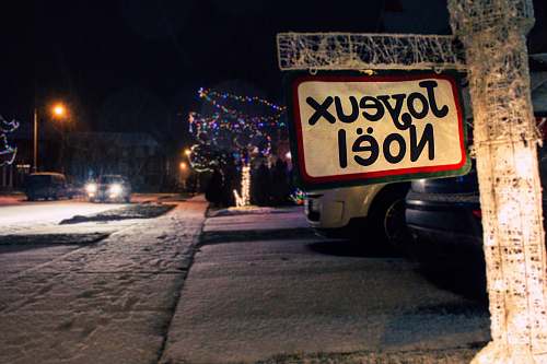 license plate Joyeux Noel street sign text